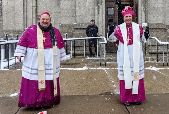 Archbishop Bernard Hebda and Bishop Andrew Cozzens give Easter Blessings from the Cathedral of Saint Paul, National Shrine of the Apostle Paul this afternoon to people driving by. Cars of people wishing to receive blessings were backed up to Interstate 94 at times.