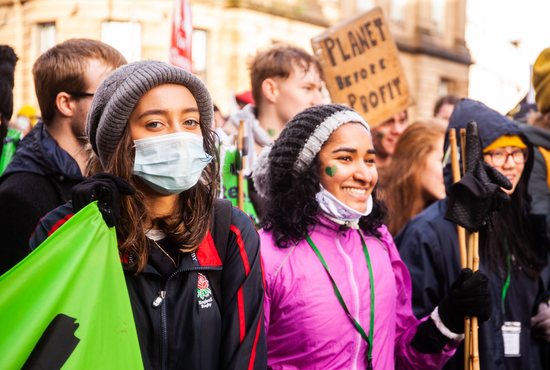 Young women from London join a protest during a Day of Action at the U.N. Climate Change Conference in Glasgow, Scotland, Nov. 6, 2021.