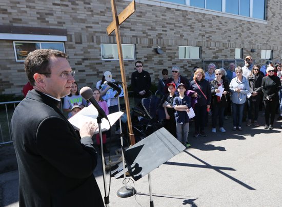 Bishop Andrew Cozzens addresses those gathered at Planned Parenthood in St. Paul in 2019 for the annual Good Friday Prayer Service for Life by Pro-Life Action Ministries.