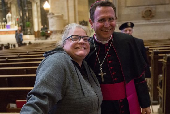 Gina Barthel greets Bishop Andrew Cozzens after his Mass of Thanksgiving Nov. 28 at the Cathedral of St. Paul in St. Paul.