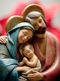 Mary, Joseph and the baby Jesus are depicted in a wooden creche at Sacred Heart Cathedral in Rochester, N.Y.