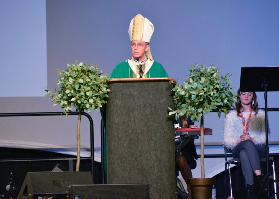 Indianapolis Archbishop Charles C. Thompson delivers a homily during the opening Mass Nov. 18, 2021, for the National Catholic Youth Conference in the Indiana Convention Center in Indianapolis.