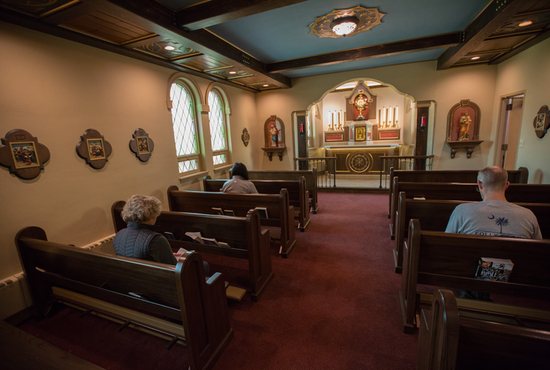 People pray in the adoration chapel at St. Rose of Lima in Roseville Nov. 24.