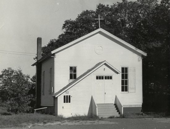 In 1952, parishioners of St. Joseph in Taylors Falls moved their 1874 wood frame church two miles down from a hilltop to a more central site downtown.