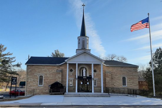 Additions on both sides and interior renovation have expanded the church of St. Joseph since it came down the hill to its present location on Bench Street in Taylors Falls.