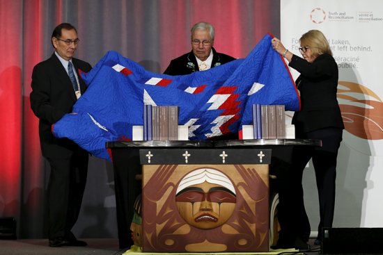 Cree Chief Wilton Littlechild, Justice Murray Sinclair and Commissioner Marie Wilson unveil the Truth and Reconciliation Commission's final report in Ottawa, Ontario, Dec. 15, 2015. Littlechild was among those named to the board of a Canadian bishops' charity to promote Indigenous reconciliation and healing.