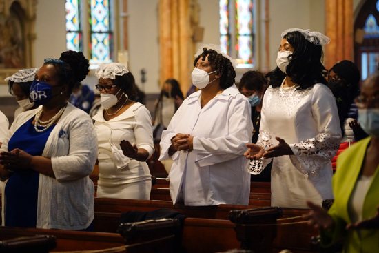 Members of the Ladies Auxiliary of the Knights of Peter Claver pray during a Mass marking Black Catholic History Month Nov. 21, 2021, at Our Lady of Victory Church in the Bedford-Stuyvesant section of Brooklyn, N.Y. 