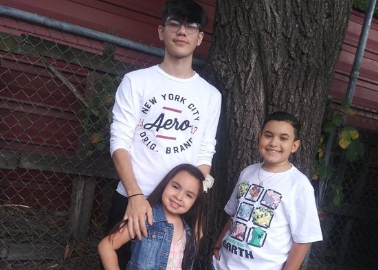 The children of single mother Jessica Moreno of Wood Dale, Ill., Julian, 16, Jenesis, 6, and Jayden, 12, are seen in an undated photo. Moreno used a series of $750-a-month checks under the expanded child tax credit program to rent an apartment for herself and her children and avoid becoming homeless.