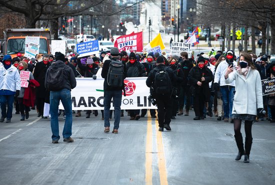 Journalists cover March for Life participants as they make their way toward the U.S. Supreme Court building Washington Jan. 29, 2021, amid the coronavirus pandemic. 