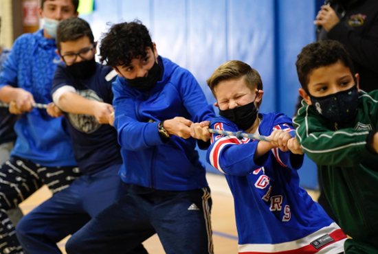 Students compete in a game of tug of war Feb. 1, 2022, at St. Patrick School in Smithtown, N.Y. The event was one of many special activities scheduled by the school to celebrate Catholic Schools Week.
