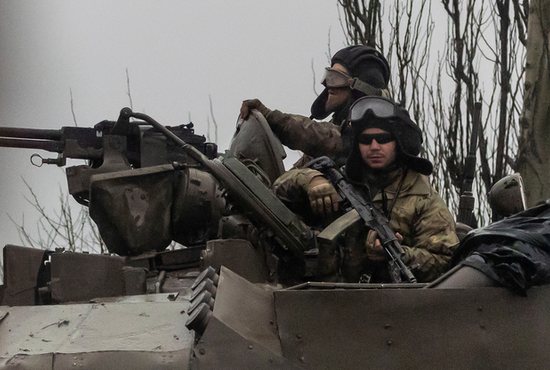Ukrainian tanks move into Mariupol, Ukraine, after Russian President Vladimir Putin authorized a military operation in Ukraine, Feb. 24, 2022. 