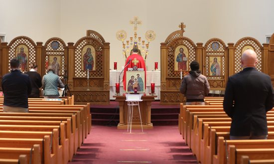 People pray during a morning Divine Liturgy at the Ukrainian Catholic National Shrine of the Holy Family in Washington Feb. 24, 2022, after Russia invaded Ukraine.