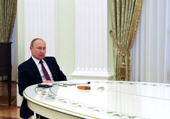 Russian President Vladimir Putin attends a meeting with German Chancellor Olaf Scholz in Moscow Feb. 15, 2022. 