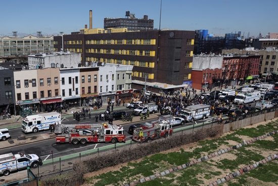 General view of the scene of a shooting at a subway station in the Brooklyn borough of New York City April 12, 2022. 