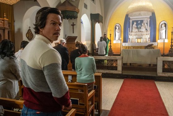 Mark Wahlberg stars in a scene from the movie "Father Stu."