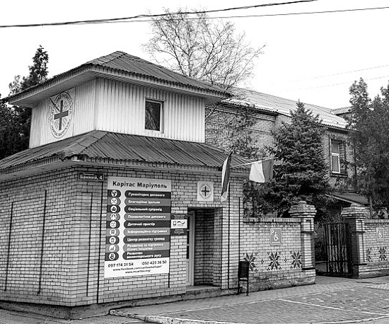 The Caritas Ukraine office in Mariupol is pictured in a screenshot. In a statement published on its website, Caritas Ukraine said several people "were hiding from shelling and looking for a safe haven" in its Mariupol office when a Russian tank fired on the building, killing seven people.