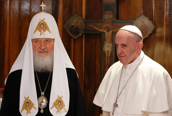Russian Orthodox Patriarch Kirill of Moscow and Pope Francis pose for photos at the beginning of their meeting at Jose Marti International Airport in Havana in this Feb. 12, 2016, file photo. In an interview with the Italian newspaper Corriere della Sera, published May 3, 2022, Pope Francis warned that the Russian Orthodox patriarch should not "turn himself into Putin's altar boy." He also said he would like to go to Moscow to meet Vladimir Putin in an attempt to end the conflict in Ukraine.
