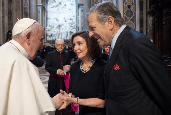 Pope Francis greets U.S. House Speaker Nancy Pelosi, D-Calif., accompanied by her husband, Paul, before Mass on the feast of Sts. Peter and Paul in St. Peter's Basilica at the Vatican June 29, 2022.