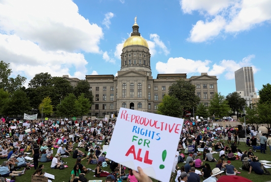 Abortion demonstrators are seen in Atlanta May 14, 2022. The 11th U.S. Circuit Court of Appeals July 20 reversed a lower court decision and said Georgia's "heartbeat law" should be permitted to take effect immediately. It bans abortions once a fetal heartbeat is detected, which is about six weeks into a pregnancy.