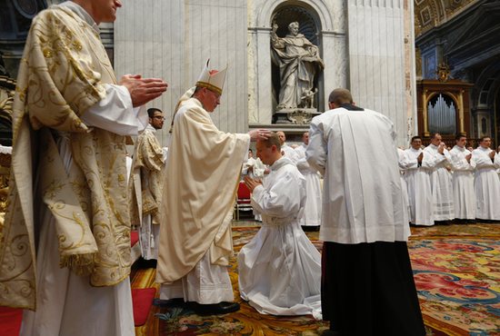 Bishop Austin Vetter lays hands on Deacon Ryan Glaser of the Archdiocese of St. Paul and Minneapolis Sept. 29 in St. Peter’s Basilica at the Vatican. Deacon Glaser, of St. Michael in Prior Lake, is studying for the priesthood at the Pontifical North American College in Rome.