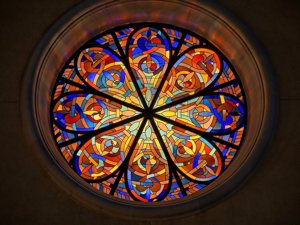 A stained-glass window at the Norbertine order's Church of Our Lady of the Assumption in Silverado, Calif., is seen in this undated photo. The window will -- as it was designed to do by architect Jean-Louis Pagès -- flood the altar with evening sunlight at the beginning of the vespers service at 5:30 p.m., Sept. 29, 2022, the feast day of St. Michael and All Angels.