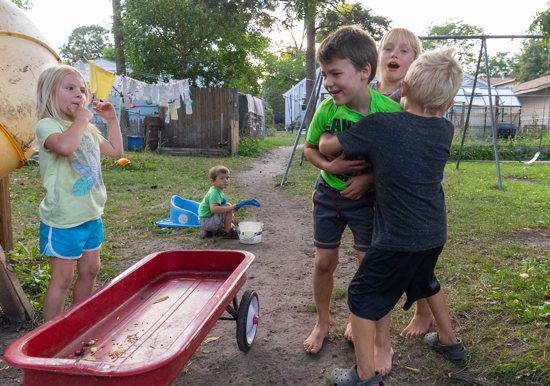 Children play after dinner.