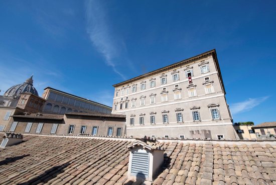 Pope Francis leads the Angelus from the window of his studio overlooking St. Peter's Square at the Vatican Oct. 16, 2022.