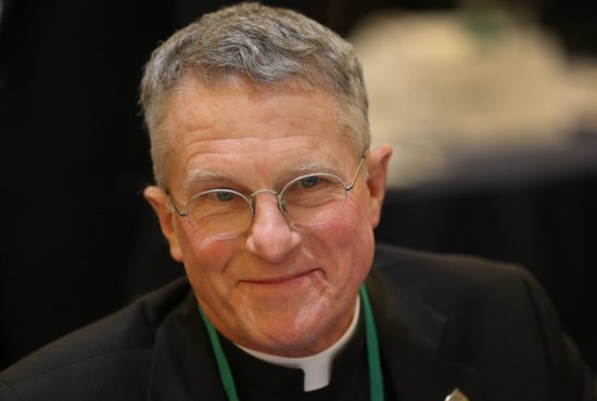 Archbishop Timothy P. Broglio of the U.S. Archdiocese for the Military Services smiles Nov. 15, 2022, after being elected president of the U.S. Conference of Catholic Bishops during a session of the fall general assembly of the bishops in Baltimore.