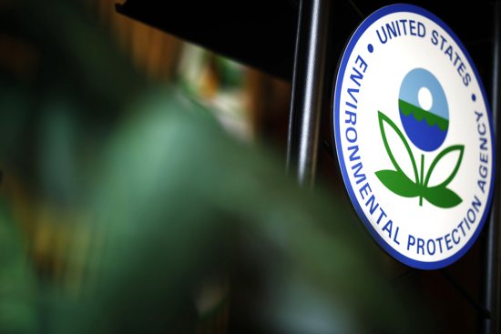 The U.S. Environmental Protection Agency's sign is seen on the podium at EPA headquarters in Washington July 11, 2018. The EPA proposed the first federal limits on "forever chemicals" in drinking water March 14, 2023, a move the Biden administration said will save thousands of lives and prevent some serious illnesses attributed to exposure to these chemicals over time.