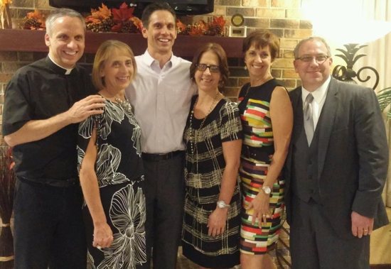 Bishop-elect Michael Izen, left, with his siblings Mary, Paul, Ann, Geri and Tom in September 2015, at the wedding reception in Fairmont for Tom’s son, Matthew, and his wife, Tiphanie.