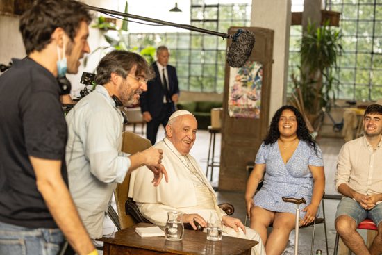 Pope Francis speaks with young people in Rome in this undated photo for a documentary, "The Pope: Answers," released by Disney+ April 5, 2023.