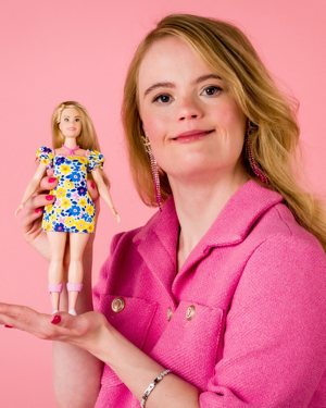 Model and influencer Enya from the Netherlands holds Barbie's first doll with Down syndrome, in Haarlem, Netherlands, in this undated Mattel handout image.