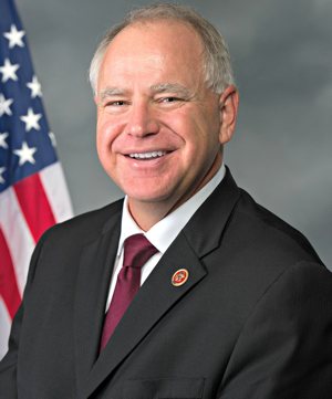 Democratic Minnesota Gov. Tim Walz, pictured in an undated photo, signed into law two bills regulating gun safety May 19, 2023.Democratic Minnesota Gov. Tim Walz, pictured in an undated photo, signed into law two bills regulating gun safety May 19, 2023.