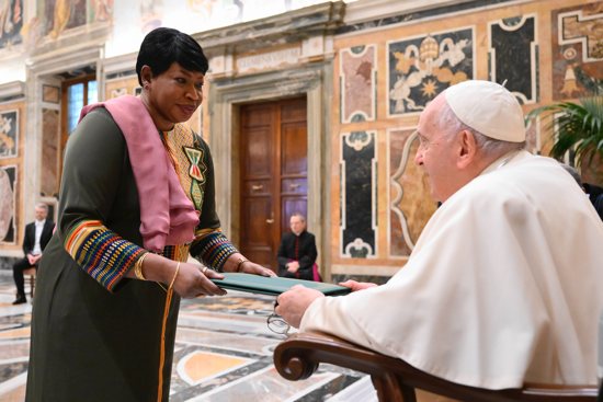 Fatou Bom Bensouda presents to Pope Francis her letters of credential as Gambia's ambassador to the Holy See during an audience in the Apostolic Palace at the Vatican May 13, 2023. 