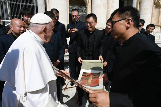 Pope Francis greets chaplains of the Chinese Catholic community in Italy at the end of his weekly general audience May 24, 2023, in St. Peter's Square. On the May 24 feast of Mary, Help of Christians, venerated as Our Lady of Sheshan in China, the Catholic Church prays for Catholics in the Asian nation.