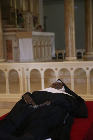 The exhumed body of Sister Mary Wilhelmina Lancaster, foundress of the Benedictines of Mary, Queen of Apostles, lies in repose in the church at the Abbey of Our Lady of Ephesus in Gower, Mo., May 21, 2023.