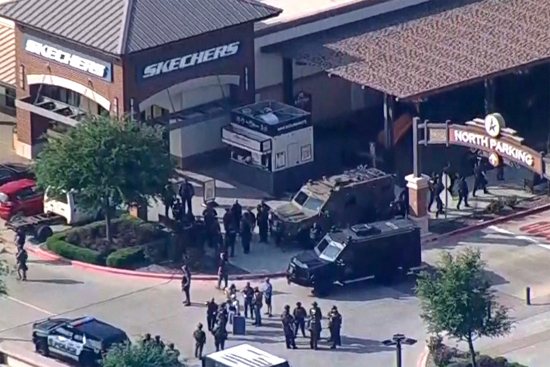 Police respond to a shooting in the Dallas area's Allen Premium Outlets May 6, 2023, in a still image from video. Hours later law enforcement said the shooter, who was killed by police, had left at least eight people dead and injured at least seven others, some seriously.