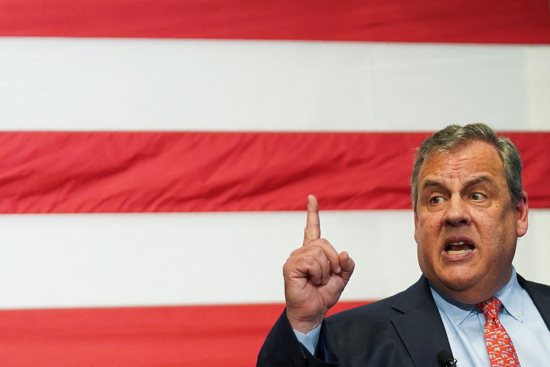Former New Jersey Gov. Chris Christie answers a question as he launches his bid for the 2024 Republican presidential nomination at the Institute of Politics at St. Anselm College in Manchester, N.H., June 6, 2023.