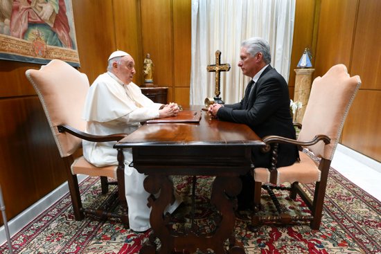 Pope Francis speaks with Cuban President Miguel Díaz-Canel during a private meeting June 20, 2023, in the papal studio of the Vatican audience hall.