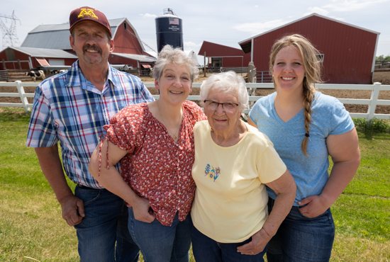 From left, Tim and Amy Leonard, her mother, Elaine Buesgens, and their daughter Christine represent three generations who have worked on the family farm.