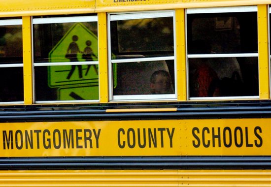 A bus is pictured in a file photo leaving a school in Montgomery County, Md. A New Jersey case concerns three Monmouth County school districts who want teachers to notify parents if a student comes out as transgender, while a similar case was thrown out in Maryland.