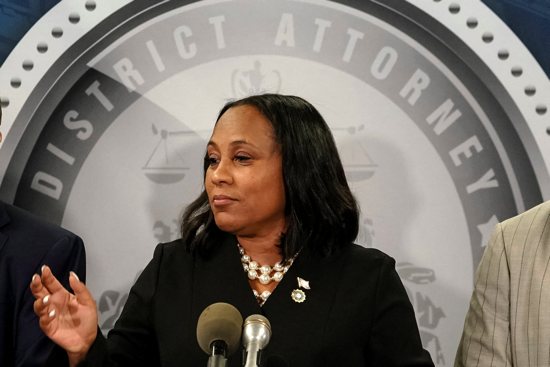 Fulton County District Attorney Fani Willis speaks to the media in Atlanta Aug. 14, 2023, after a grand jury handed down indictments against former President Donald Trump and 18 of his allies in their alleged attempt to overturn the state's 2020 election results.