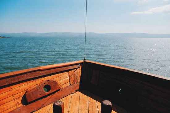 View from the front of a boat sailing the Sea of Galilee