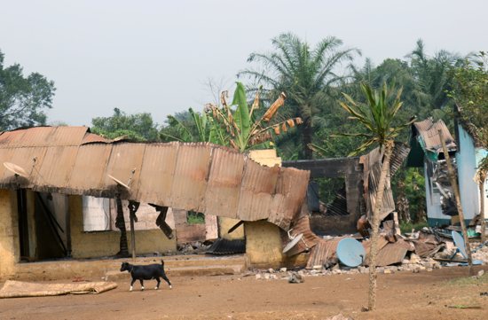 A file photo shows burned and damaged buildings in Kembong, Cameroon. A Catholic priest and three Catholic teachers in Cameroon's troubled southwest region were recovering from bullet wounds after they were shot in what church authorities say was a targeted attack on a Catholic primary school in Kembong Sept. 26, 2023. The attack comes amid seven years of a separatist conflict in the African country.