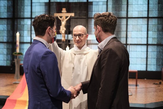 Father Christian Olding blesses a gay couple during the blessing service "Love Wins" in the Church of St. Martin in Geldern May 6, 2021. Pope Francis has indicated an openness to considering with pastoral prudence the subject of blessing same-sex couples, so long as it's clear this is not a sacramental union akin to the sacrament of matrimony.