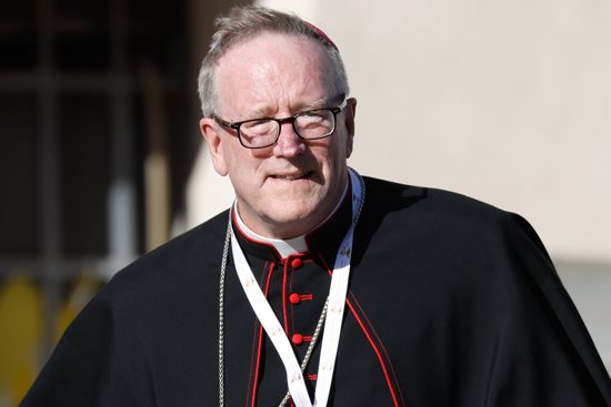Bishop Robert E. Barron of Winona-Rochester, Minn., arrives for the first working session of the assembly of the Synod of Bishops at the Vatican Oct. 4, 2023.
