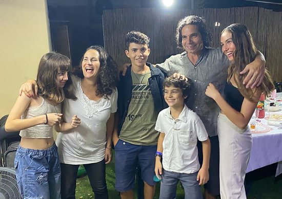 Hadas, second from left, and Ofer Kalderon, second from right, pose in an undated family photo in Kibbutz Nir Oz, Israel, with their four children, from left, Sahar, now 16; Rotem, 19; Erez, 12; and Gaia, 21. Sahar and Erez along with their father were taken hostage by Hamas Oct. 7, 2023, and Hadar has received no word of their fate. They were not in any of the three groups released by Hamas Nov. 24-26. Her mother and niece have been reported murdered in Gaza.