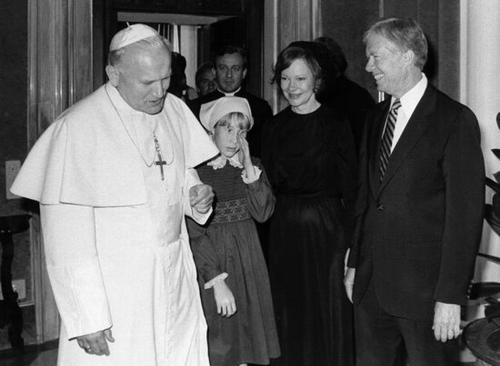 St. John Paul II meets with then-President Jimmy Carter, his wife, Rosalynn, and daughter, Amy, at the Vatican in June of 1980. First lady Rosalynn Carter died Nov. 19, 2023, at age 96. She was her husband's closest adviser to Jimmy Carter during his one term as U.S. president and their four decades thereafter as global humanitarians.