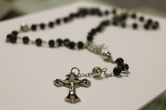 A rosary that Cassandra Falcone, an Ohio woman, assembled with beads uncovered during a cleanup in western Kentucky after devastating tornadoes in December 2021 is seen Sept. 14, 2023. Falcone, who took a parish mission trip to help with post-tornado recovery in the Diocese of Owensboro, sent the rosary to Bishop William F. Medley of Owensboro.