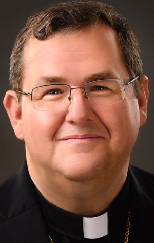 Bishop John C. Iffert of Covington, Ky., is pictured in an undated photo. Bishop Iffert has rescinded permission for Father Shannon Collins, pastor of Our Lady of Lourdes Parish in Park Hills, and Father Sean Kopczynsji, parochial vicar, to minister in his diocese after they publicly dismissed the contemporary celebration of the Mass as "irrelevant."